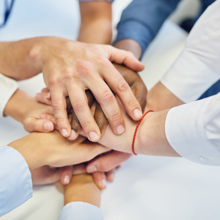 Picture of a team bonding over team building activities to represent the power of serious games in team building exercises